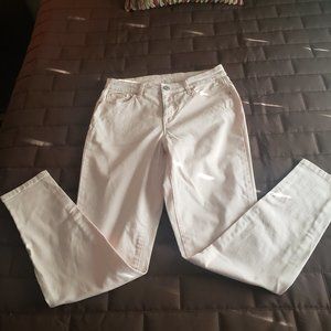 Pale pink skinny jeans
